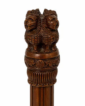 Ashoka Pillar Lion Capital Close-Up — Four Asiatic Lions Standing Back-to-Back on Abacus with Dharma Chakra and Lotus Bell Base, Sarnath Sculpture Detail (VastuGuruji)