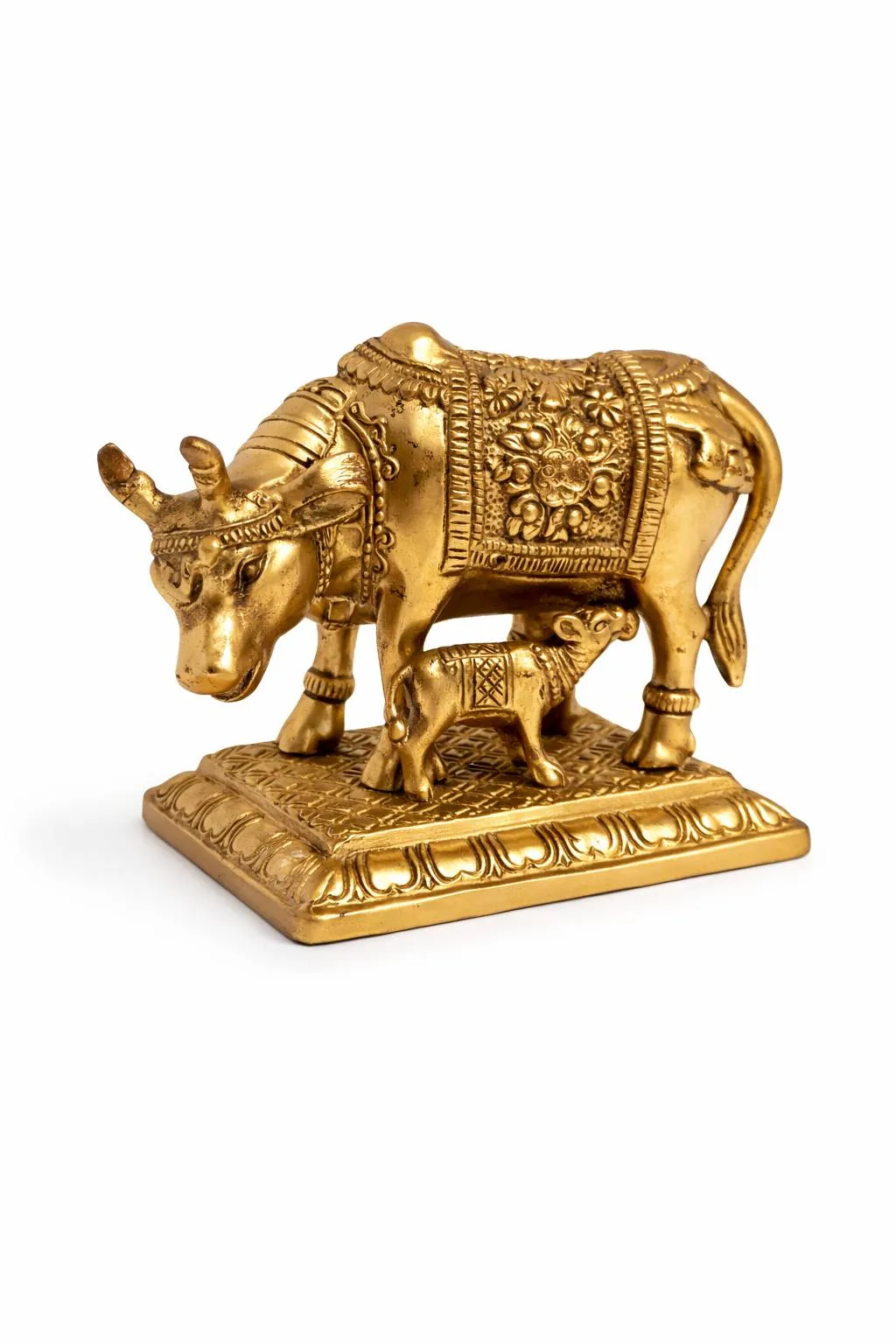 Kamdhenu Cow Brass Statue on weighing scale showing 982g — verified weight (Vastuguruji)